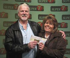 Ron and Rhonda Campbell of Tottenham, Ontario at the OLG. offices in Toronto to claim the $16 million they won in the Dec. 29, 2007 Lotto Super 7 draw.