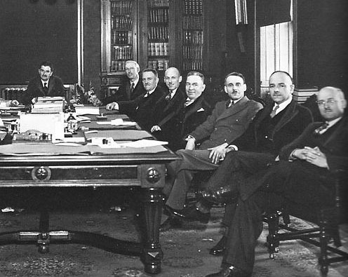 Jack Layton’s grandfather, Gilbert Layton (far right), at the Duplessis provincial cabinet table in Quebec. With him are (left to right), Maurice Duplessis, Martin Fisher, OnÃ©sime Gagnon, John Bourque, William Tremblay, Joseph Bilodeau, and Thomas Joseph Coonan.