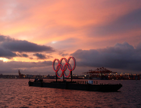 Olympic rings illuminated, on a barge moored off Stanley Park, February 12, 2010. Photograph by: Chris Helgren, Reuters.