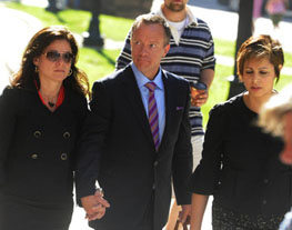 Michael Bryant, wife Susan Abramovitch (l), and lawyer Marie Henin arrive at court on Tuesday, May 25. Colin McConnell/Toronto Star.